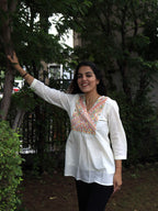 White Peplum Top