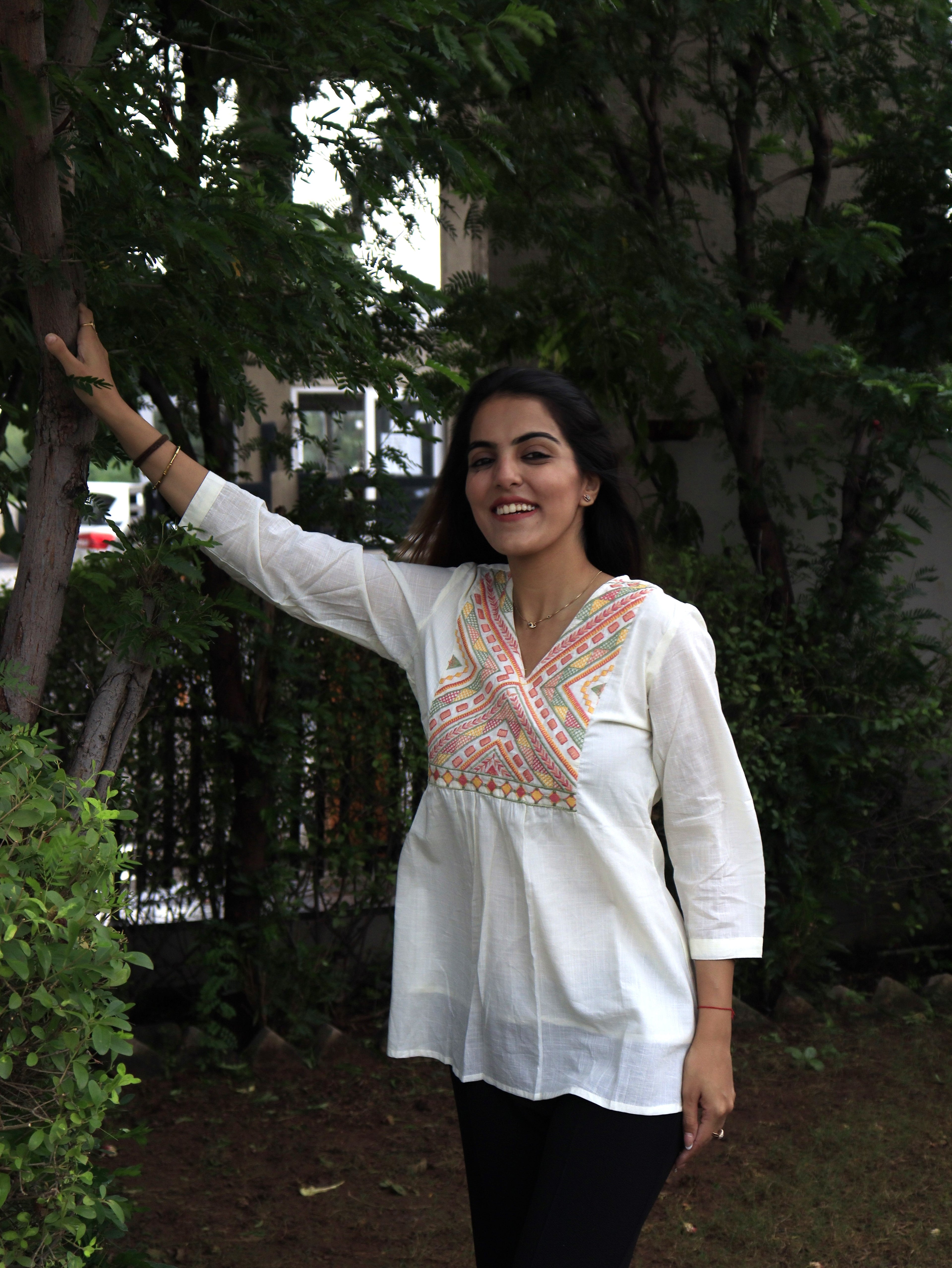 White Peplum Top