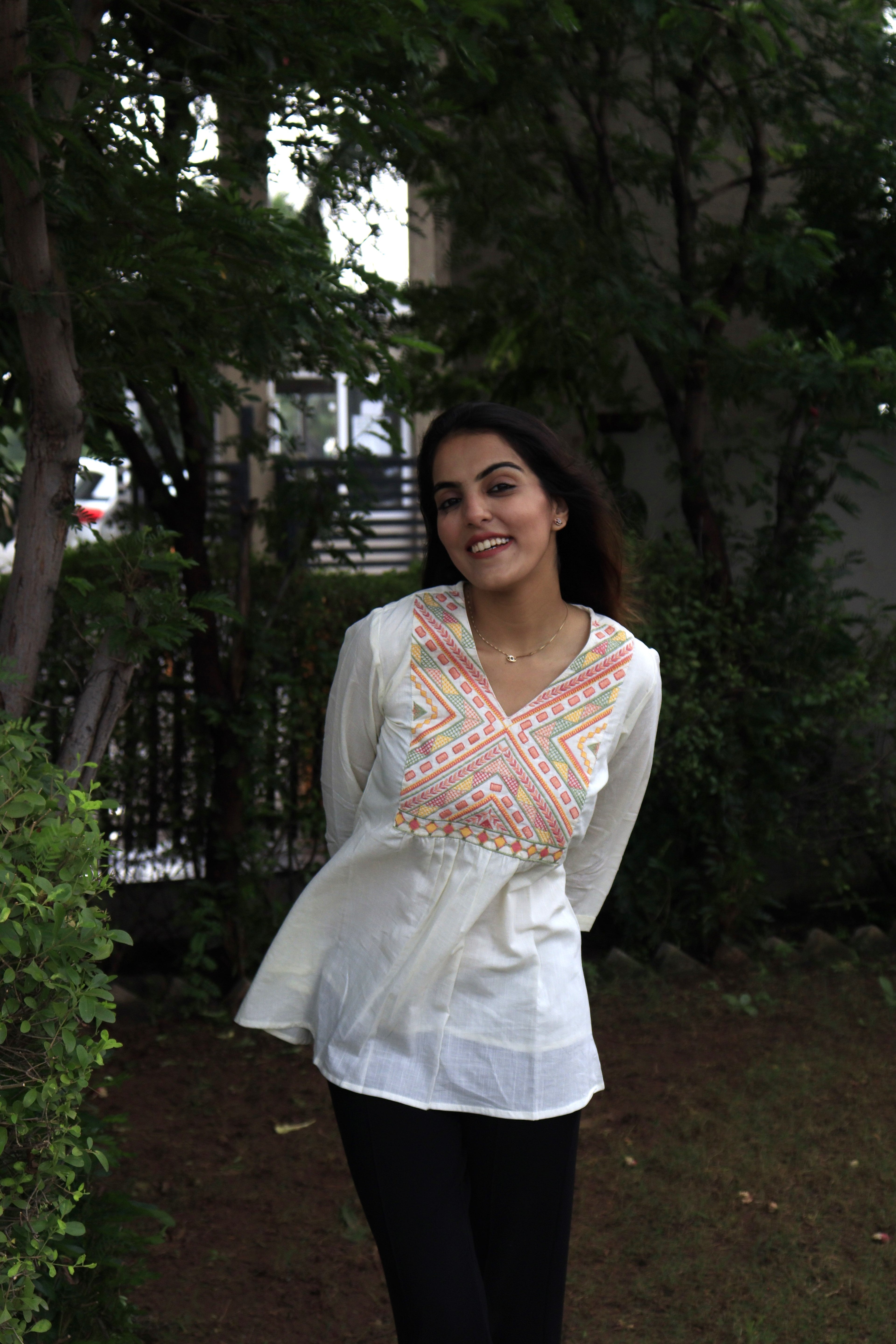 White Peplum Top