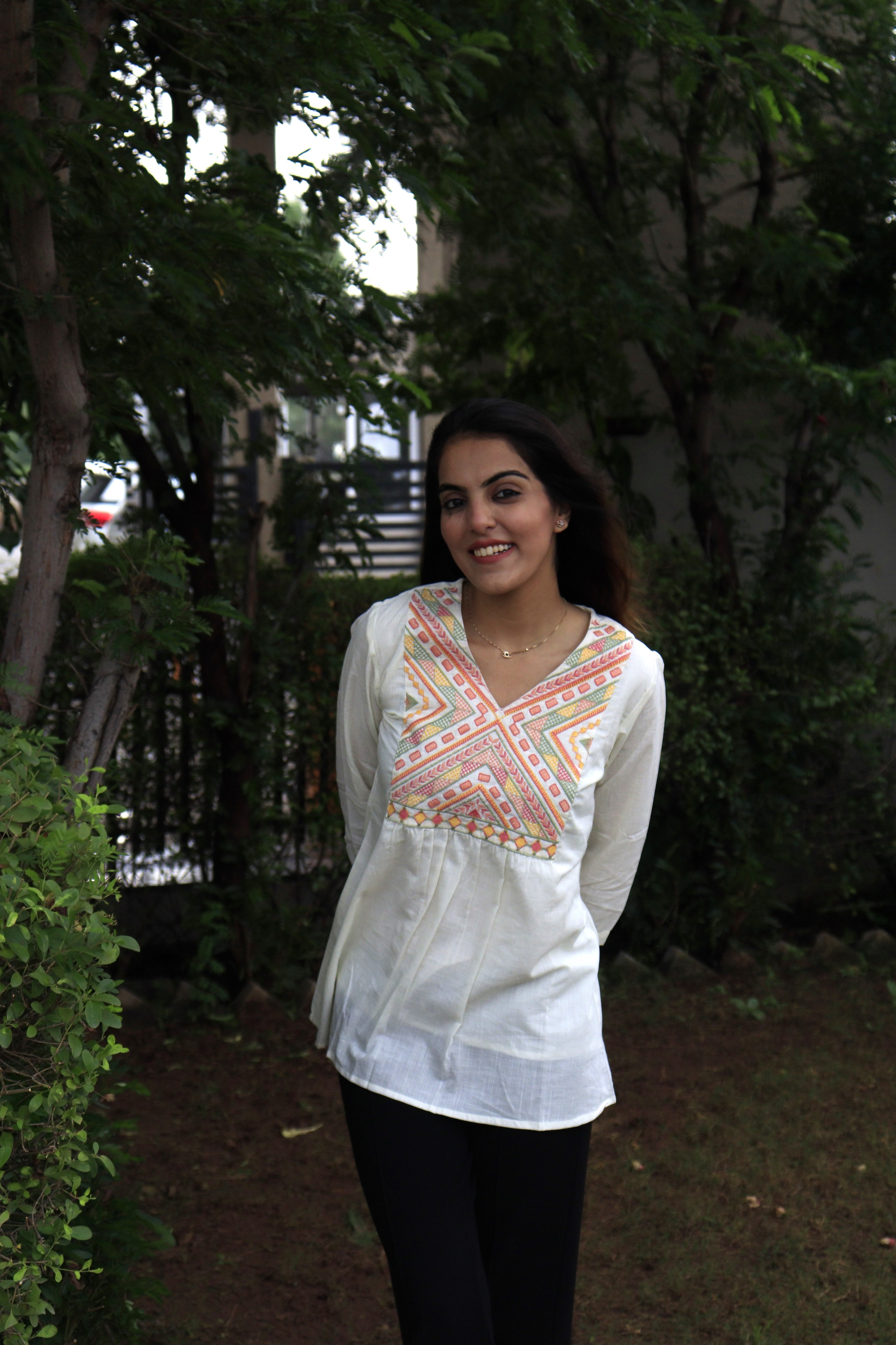 White Peplum Top